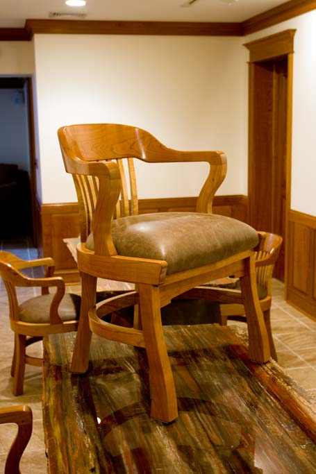 An example of the chair made for a corporate office, half in cherry half in mahogany. Note the one piece crest rail turning into the arms. This steam bent part is essential to the strength of the chair. That one piece back & arm is then mortise and tennoned to the vertical, completing a very strong arm assembly.
