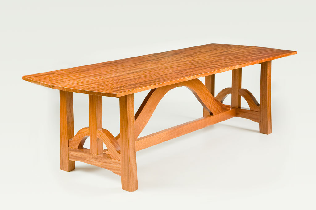 Designed after a week touring Greene & Greene houses in Pasadena, this table featured curved bracing and a bookmatched top.